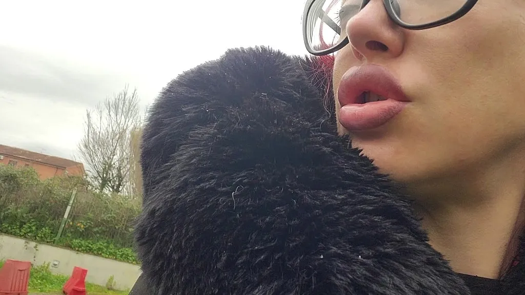 Redhead Queen's Spit Fetish: Close-up POV with Plump Lips" (53 characters)